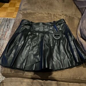 Like new Zara belted faux leather black pleated skirt. Size medium.